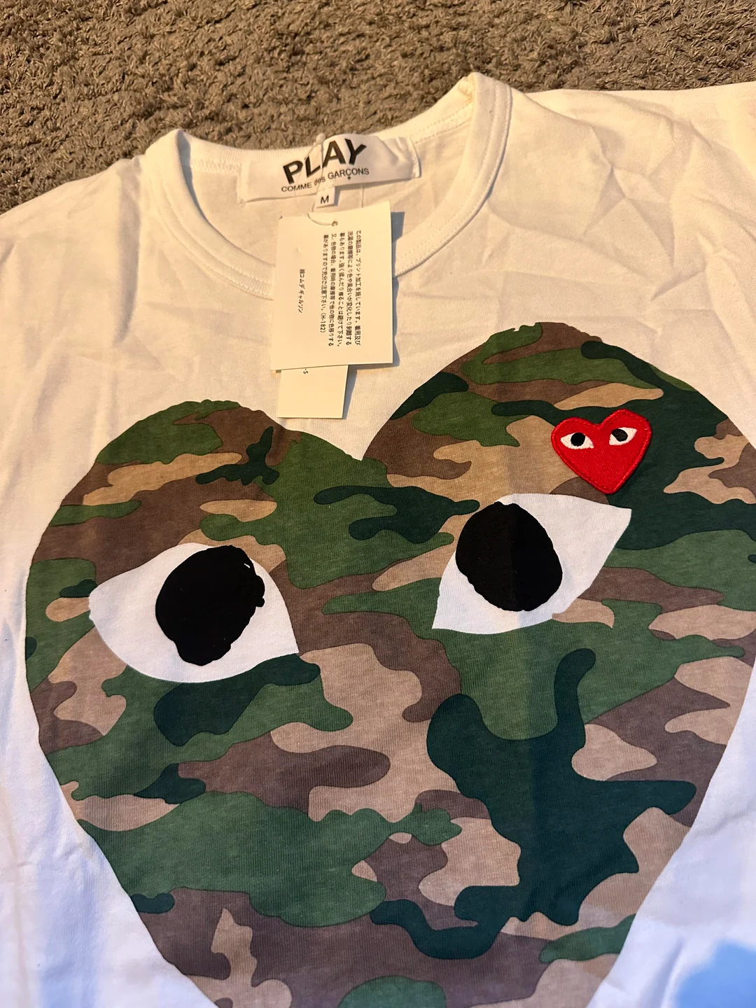 Summer-weight CDG-style tee fabric check — real LitBuy warehouse photo after spreadsheet paste
